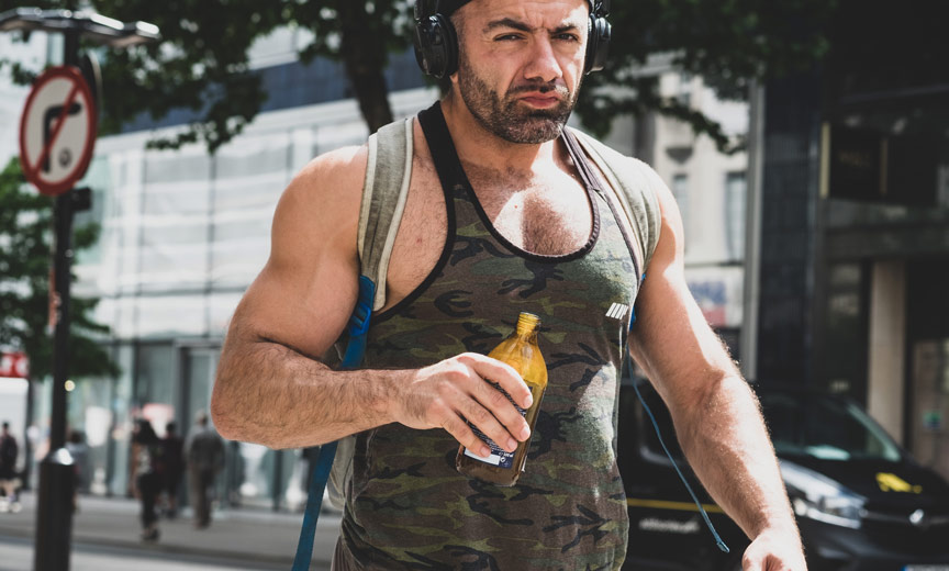 muscular guy walking