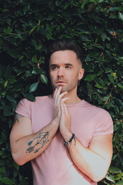 Brian Justin Crum in pink