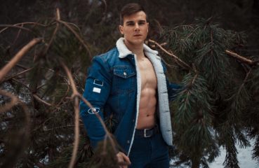 sexy man amidst the trees