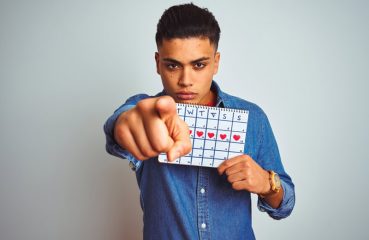 Guy With Calendar Pointing