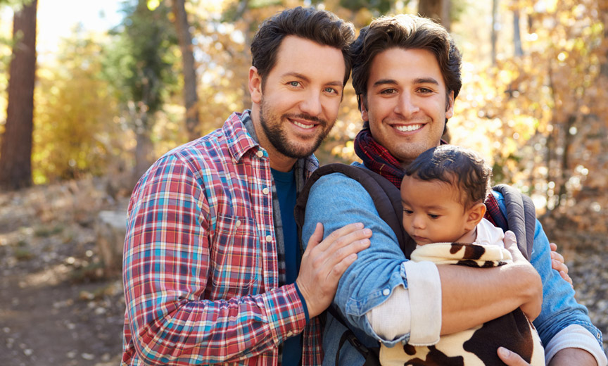 Gay Dads in the Forest with a Baby